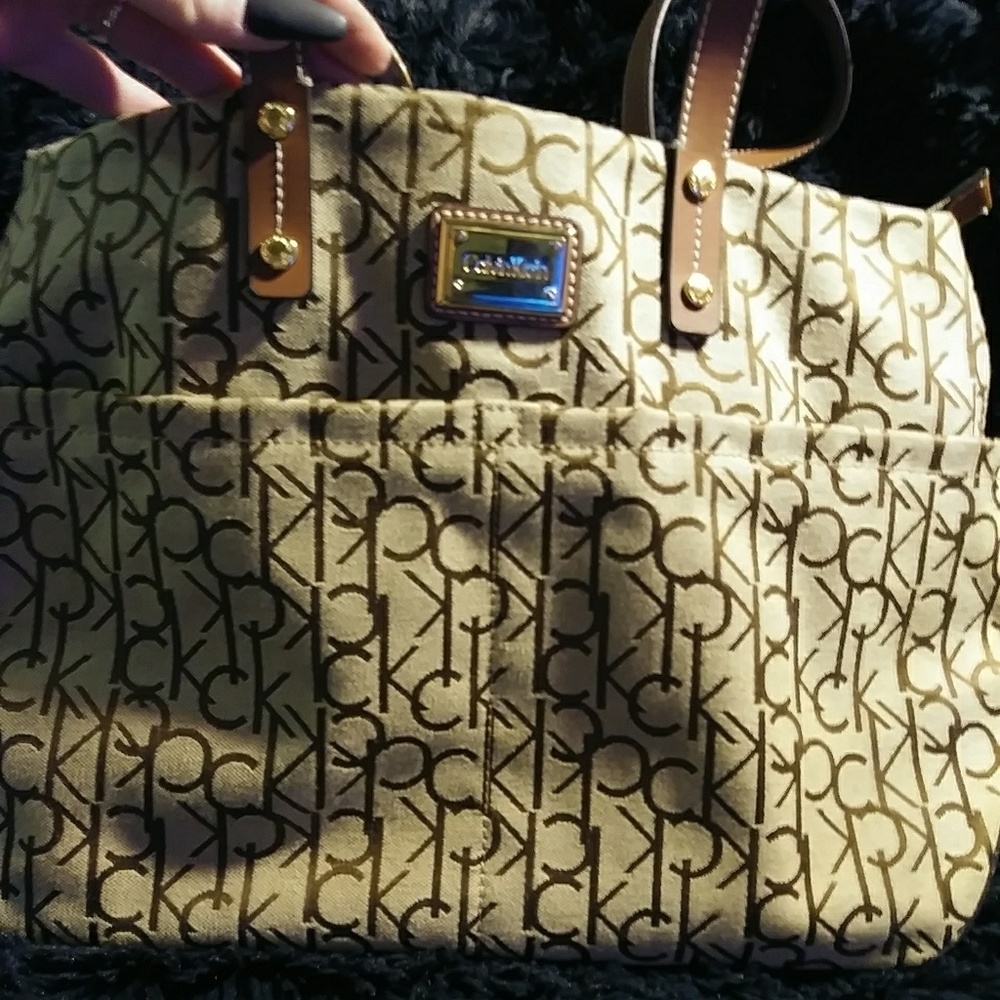 (SOLD)Calvin Klein lg monogram canvas tote